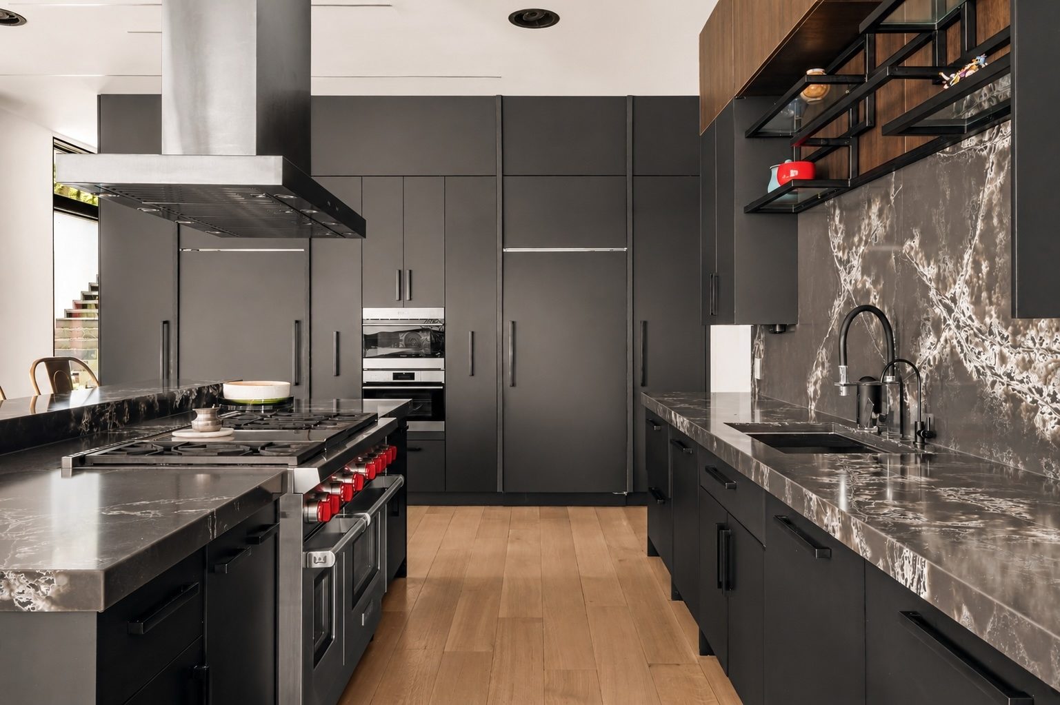 Marble island and black cabinetry at 15 Seminole Way, Short Hills